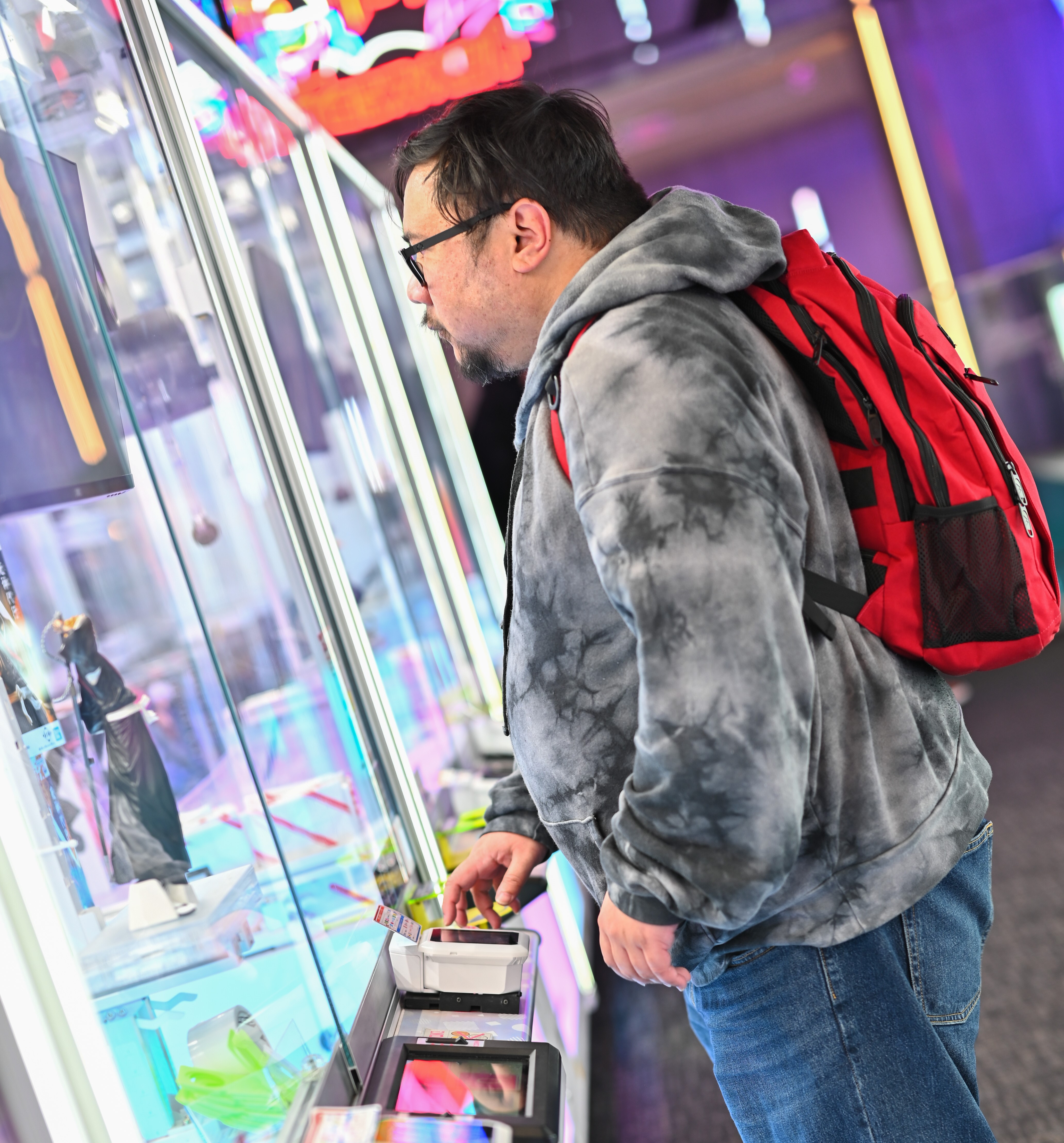 Paul Delos Santos at an arcade machine